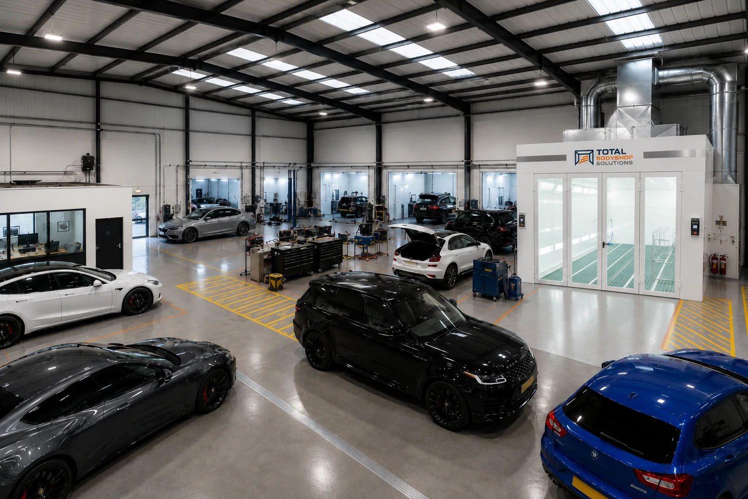 White TBS spray booth in a professional bodyshop facility